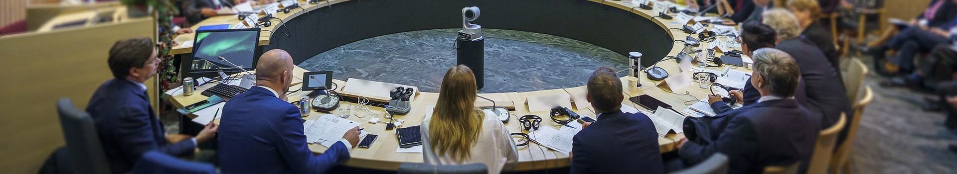 People sitting at a round conference table