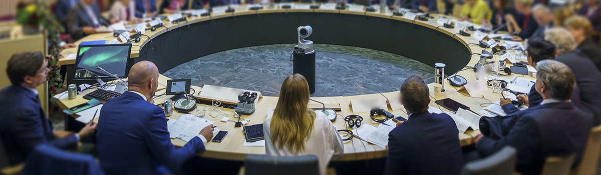 People sitting at a round conference table